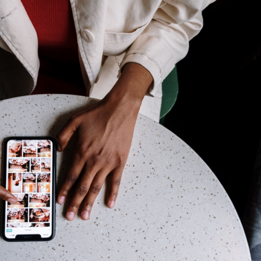 franklin music academy black woman searching online via smartphone - finding the perfect music school for kids