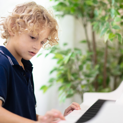 franklin music academy boy pianist - best age to start music lessons